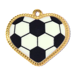 Heart-shaped soccer ball pendant detail with gold beaded border and black enamel
