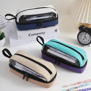 Lifestyle shot of three multi-layer Oxford cloth pencil cases with transparent windows