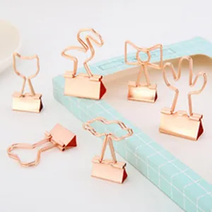 Rose gold binder clips with decorative flamingo and cactus shapes for DIY office use