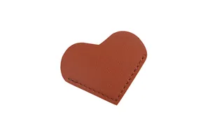 Detailed view of a brown PU leather heart bookmark with fine stitching for page corners