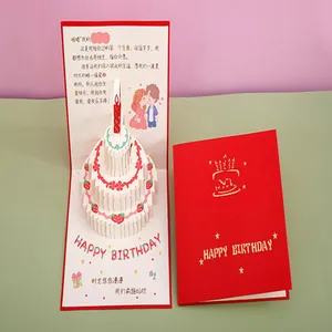 Detailed view of 3D pop-up birthday cake card featuring romantic text and red cover.