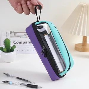 Handheld purple and teal Oxford cloth pencil case with transparent window and zipper.