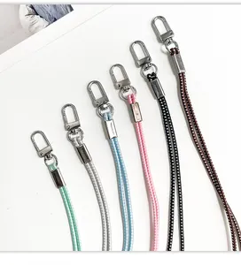 Detailed view of colorful braided phone neck lanyards with silver metal lobster clasps