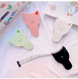 Portable body measuring tape in multiple colors with retractable scale detail