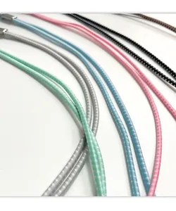 Macro detail of durable colorful braided neck lanyards for mobile phones and ID cards