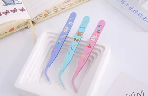 Detailed view of cute cartoon tweezers with curved tips for DIY scrapbooking
