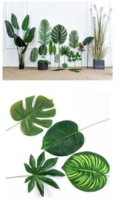 Vue détaillée de diverses feuilles de Monstera et tropicales artificielles pour la décoration.