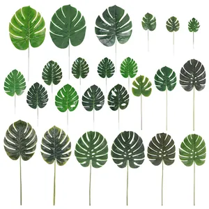 Various sizes of artificial Monstera leaves for tropical home decor and Hawaii themed parties