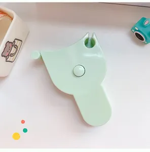 Compact mint green body measurement tape featuring a portable ergonomic handle design