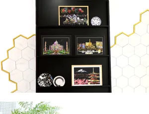 Detailed display of colorful city scenery scratch art paintings in modern black frames