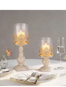 Vintage European iron candle holders with hollow patterns and glass covers for table decor