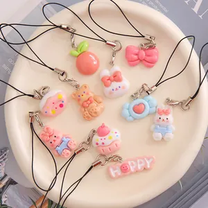 Cute cartoon resin bunny and cake charms for keychains and bag accessories.