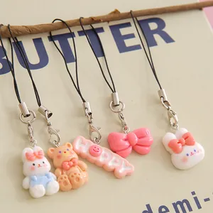 Cute cartoon resin rabbit and bear pendants for student bags, unique gift charms.