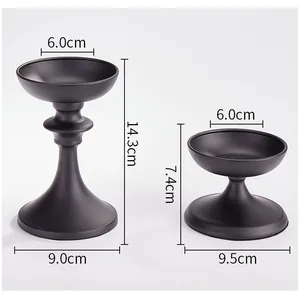 Set of two vintage black iron candle holders for Nordic home decor and weddings
