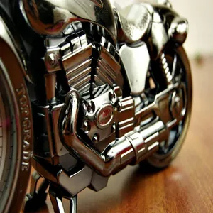 Detailed macro view of the engine parts on a creative silver motorcycle alarm clock