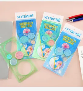 Detailed view of educational spirograph drawing ruler set with colorful plastic gears