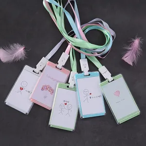 Detailed view of five colorful cartoon ID card holders with matching neck lanyards