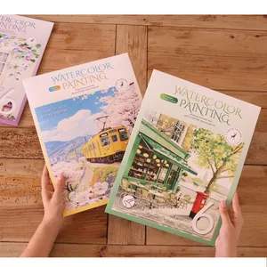Close-up view of DIY watercolor painting book set with built-in pigments for adults