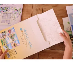 DIY watercolor painting set showing cardboard sheets being removed from the envelope