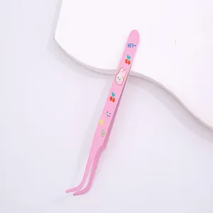Detailed view of a pink macaron cartoon-themed curved tip stainless steel tweezer