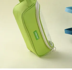 Macro detail of the large capacity lime green pencil case showing transparent window panel