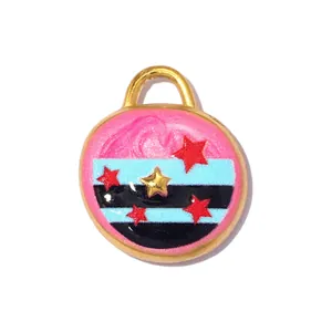 Detailed view of a colorful pink and blue striped round star pendant for DIY jewelry.