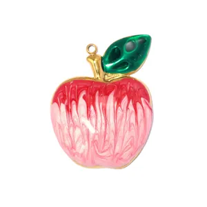 Detail of apple-shaped enamel pendant with red and pink marble pattern and green leaf