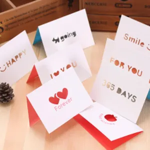 Detail view of various hollowed-out greeting cards with romantic messages