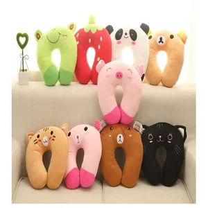 Collection of soft plush cartoon U-shaped travel neck pillows in various animal character designs