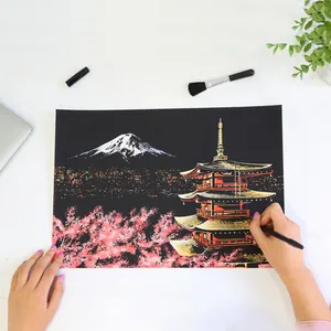 DIY scratch art paper kit featuring a colorful Mt Fuji pagoda night scene scenery