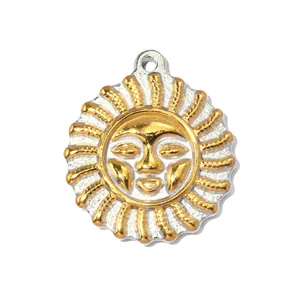 Macro view of a gold and silver sun face stainless steel jewelry pendant