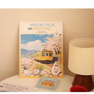 Detail view of DIY watercolor coloring book with built-in pigments on a cozy desk