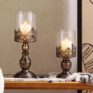 Vintage European iron candle holder set with glass hurricane shades for home decor