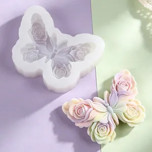 Detail view of 3D butterfly rose silicone mold with finished pastel colored candle example.