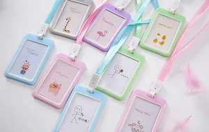 Assorted cute cartoon ID card holders with colorful lanyards for school and office