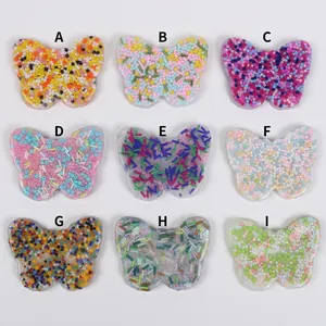 Selection of nine colorful butterfly-shaped skin picking fidget toys with beads