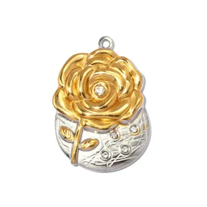 Close-up of a two-tone rose pendant with sparkling crystal details and gold finish