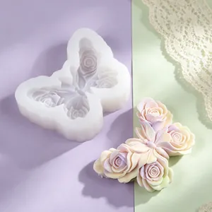 Detail of butterfly rose silicone mold showing textured interior and finished craft piece
