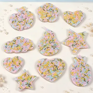 Close-up detail of various shaped sensory fidget toys filled with colorful beads for skin picking