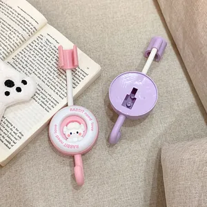 Adjustable punch-free shower head holder with hook featuring cute pink rabbit design