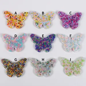 Nine colorful butterfly skin picking fidget toys for sensory stress relief in 3x3 grid