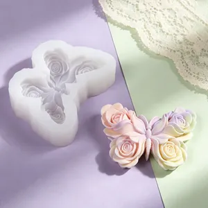 Detail view of butterfly silicone mold with rose flower patterns and finished craft