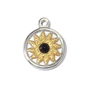 Detailed macro view of a two-tone stainless steel sun flower pendant with black center