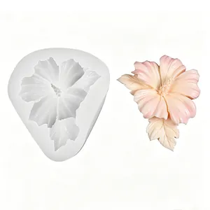 Detailed view of hibiscus flower silicone mold with pink resin resin flower sample