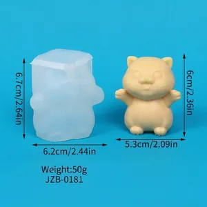 Detailed macro view of a cat shaped silicone mold showing dimensions in cm and inches