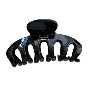 Glossy black minimalist dragon bone shark hair claw clip for women back of head hair accessories