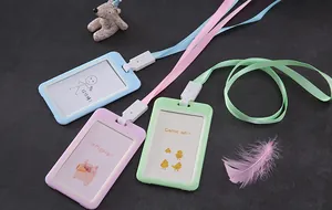 Three pastel-colored ID card holders with matching lanyards and cute cartoon inserts