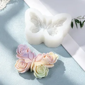 Detailed view of butterfly silicone mold with rose wing textures and finished sample.
