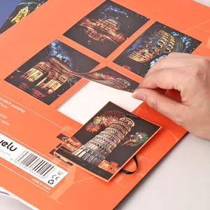 DIY rainbow scratch painting set with 4 city night scenes for adult stress relief.
