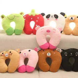 Assorted cartoon plush U-shaped neck pillows featuring cute animal and fruit designs